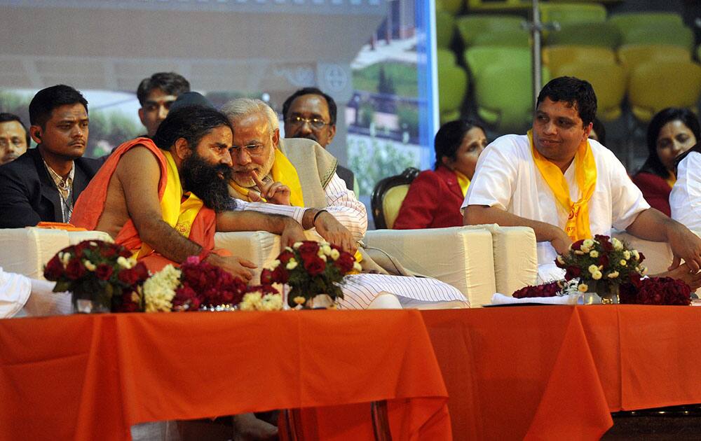 Narendra Modi was chief guest at the foundation day ceremony of yoga guru Baba Ramdev`s Bharat Swabhiman Trust, at Delhi`s Talkatora Stadium. (Pic Courtesy: DNA)