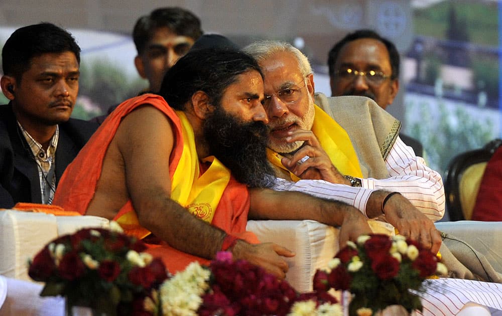 Narendra Modi was chief guest at the foundation day ceremony of yoga guru Baba Ramdev`s Bharat Swabhiman Trust, at Delhi`s Talkatora Stadium. (Pic Courtesy: DNA)