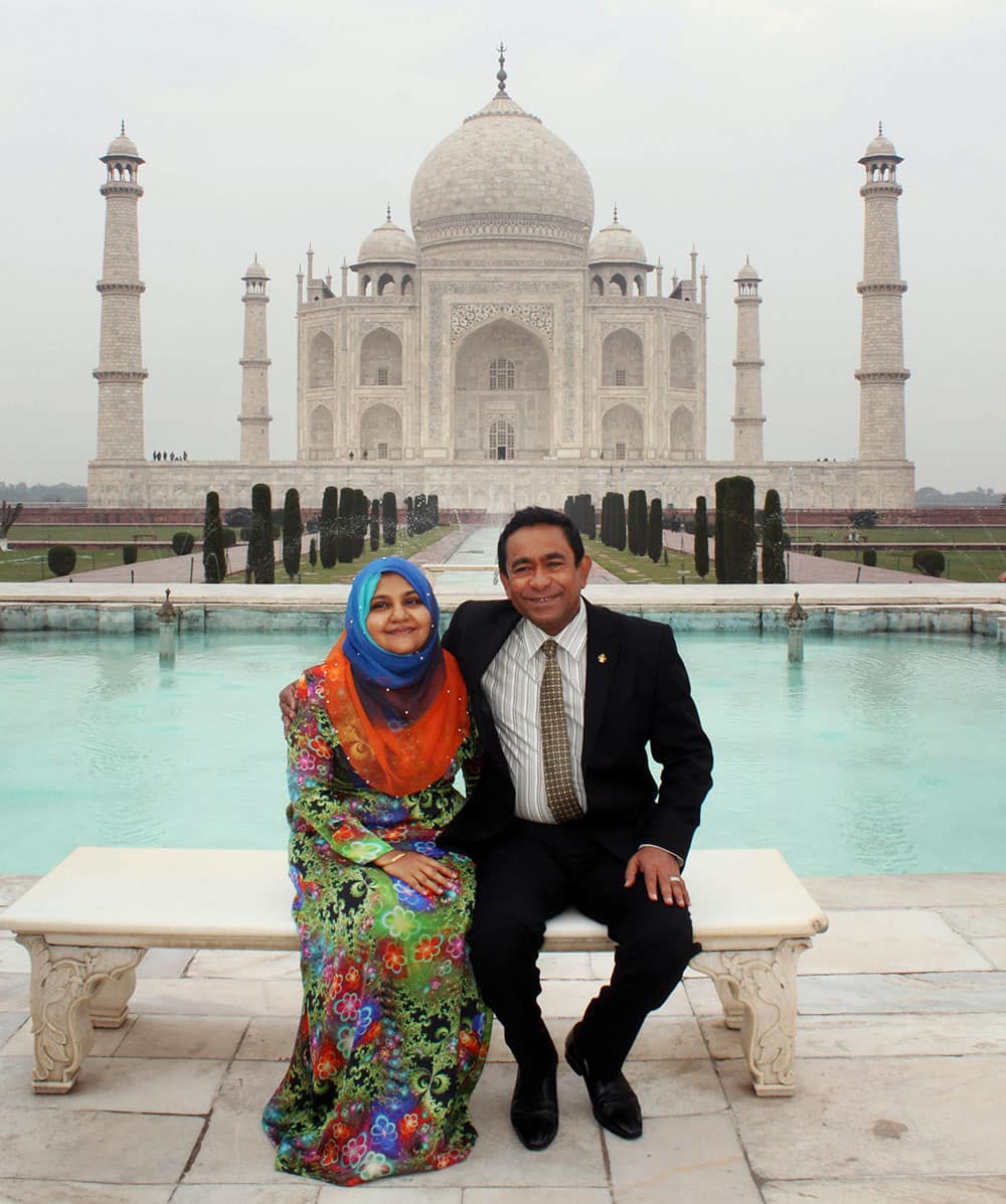 Maldives President Yaamin Abdul Gayoom and his wife Fathimath Ibrahim pose for a photograph in front of the Taj Mahal in Agra.