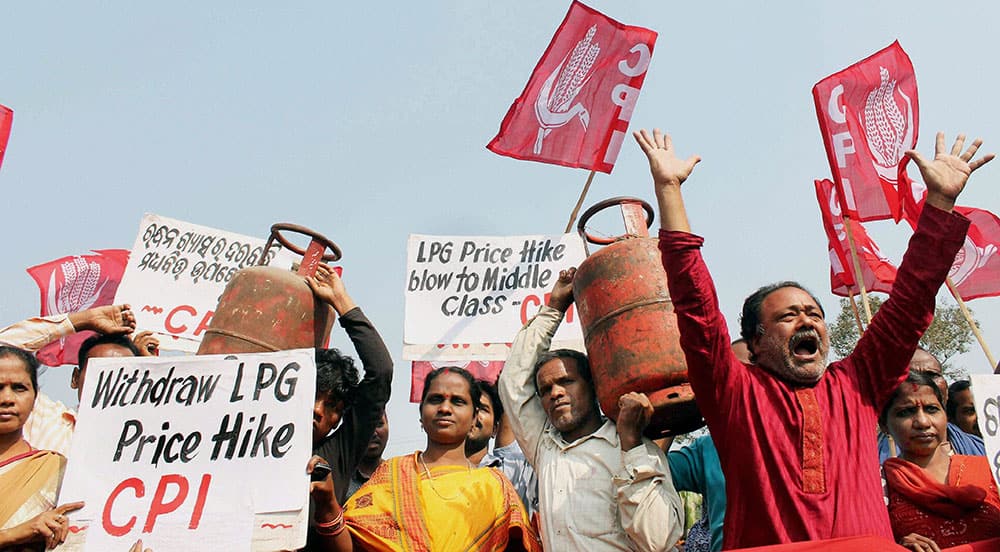 CPI activists shout slogans against the UPA government for the price hike of non-subsidized LPG cylinders in Bhubaneswar.