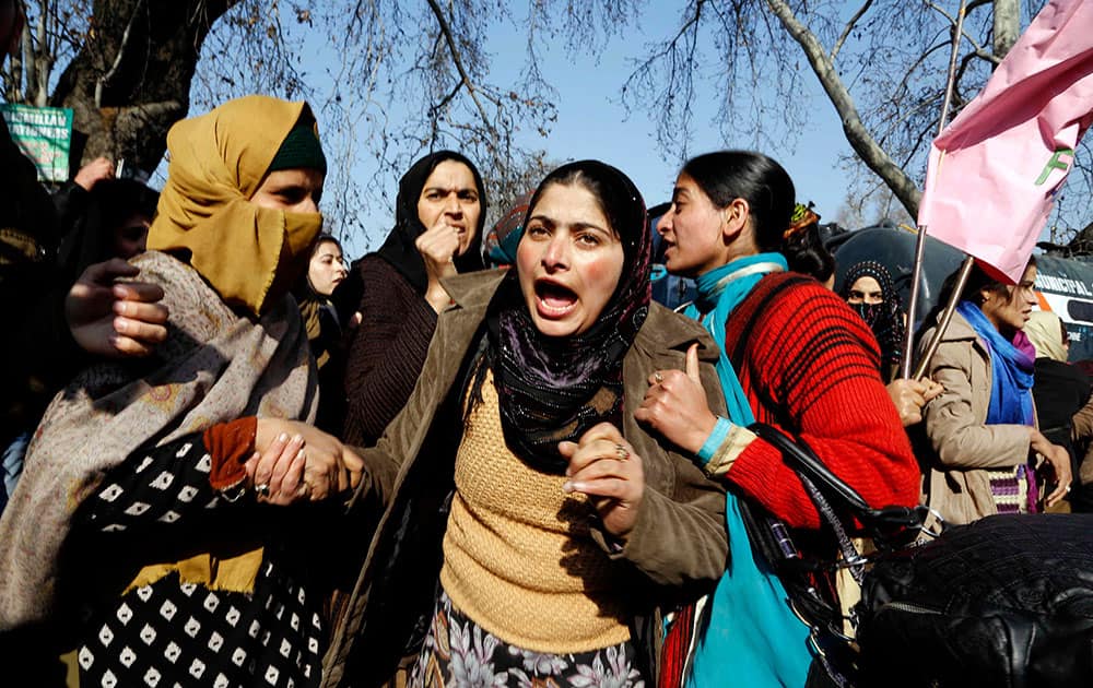A Kashmiri government employee shouts slogans against the state government during a protest in Srinagar.