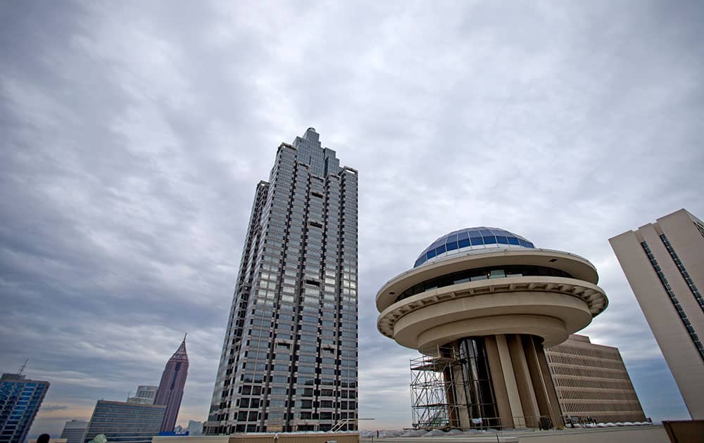 Polaris, the landmark blue dome that once dominated Atlanta`s skyline stands at right, in Atlanta. The spaceship-like structure has been vacant for years, and isn`t nearly as visible as it once was now that taller buildings have been constructed nearby. But managers of the downtown Hyatt hotel hope to harken back to the days when it opened in 1967.