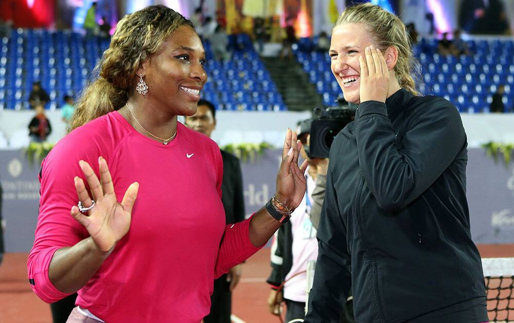 World no. 1 Serena Williams of the US, reacts with World no. 2 Victoria Azarenka of Belarus after their tennis World invitation match in Hua Hin, southern Thailand. Azarenka captured the title after beating Willams 7-5, 6-3.