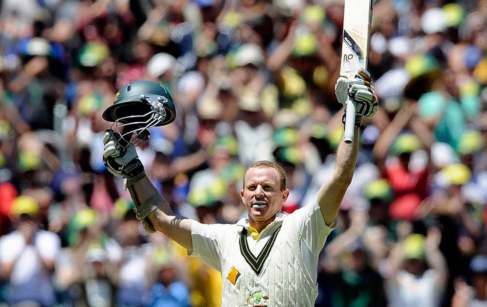 Australia`s Chris Rogers celebrates after making 100 runs against England during their Ashes cricket test match, at the Melbourne Cricket Ground in Melbourne, Australia.
