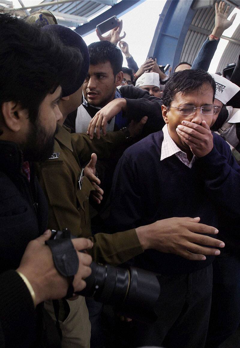 Aam Aadmi Party convener Arvind Kejriwal waits for the train at Koshambi metro station to head towards Ramlila maidan for swearing-in ceremony as the Chief Minister of Delhi.