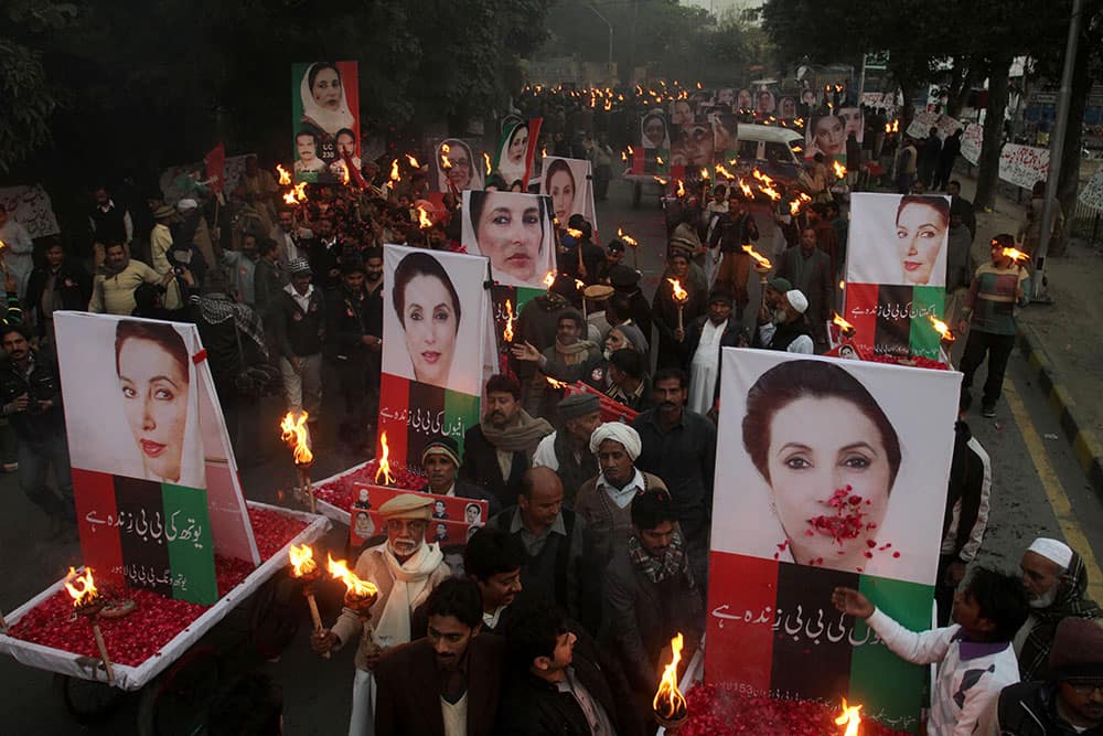 Supporter of Pakistan`s slain leader Benazir Bhutto rally in Lahore, Pakistan on the sixth anniversary of her death.