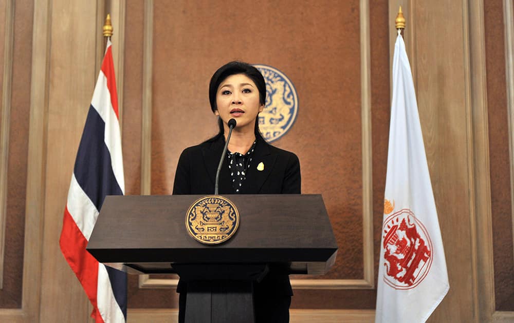 Thai Prime Minister Yingluck Shinawatra speaks at a news conference after a cabinet meeting at an Air Force base in Bangkok, Thailand.