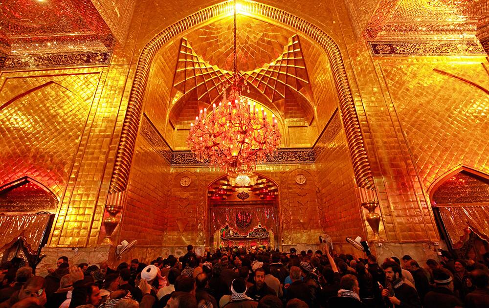 Shiite Muslim worshippers gather at the holy shrine of Imam Abbas during the Muslim festival of Arbaeen in Karbala, 50 miles (80 kilometers) south of Baghdad, Iraq.