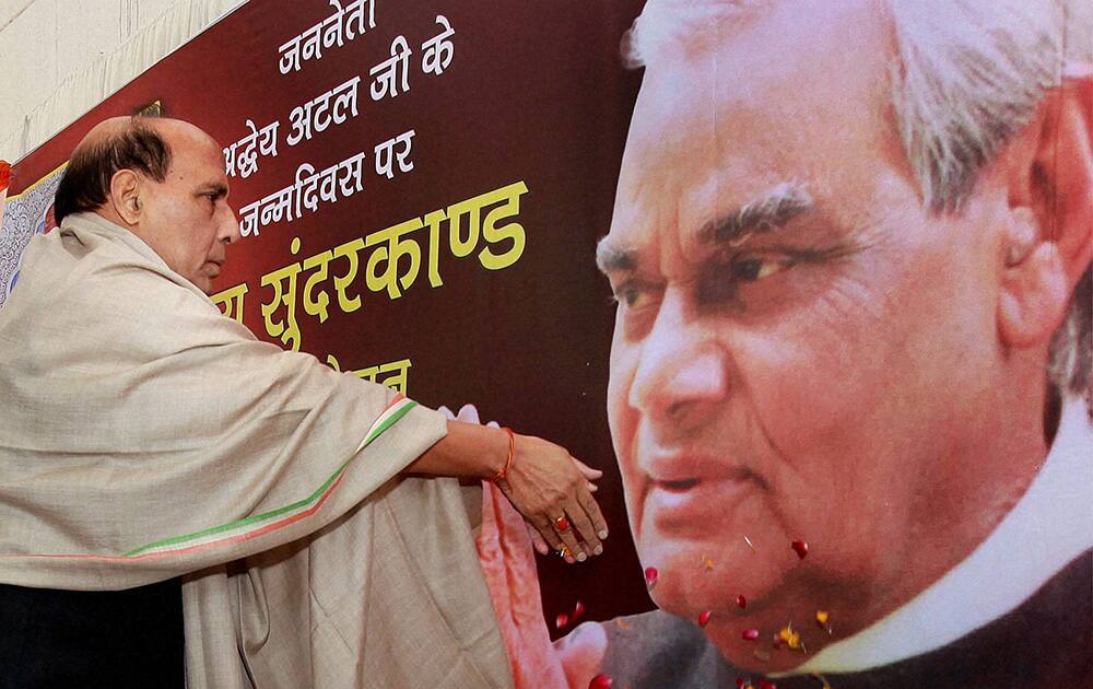 BJP President Rajnath Singh celebrating former Prime Minister Atal Bihari Vajpayee`s 89th birthday in New Delhi.