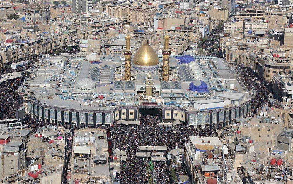 Shiite Muslim worshippers surround the holy shrine of Imam Hussein during the Muslim festival of Arbaeen in Karbala, 50 miles south of Baghdad, Iraq. The holiday marks the end of the forty day mourning period after the anniversary of the 7th century martyrdom of Imam Hussein the Prophet Muhammad`s grandson.