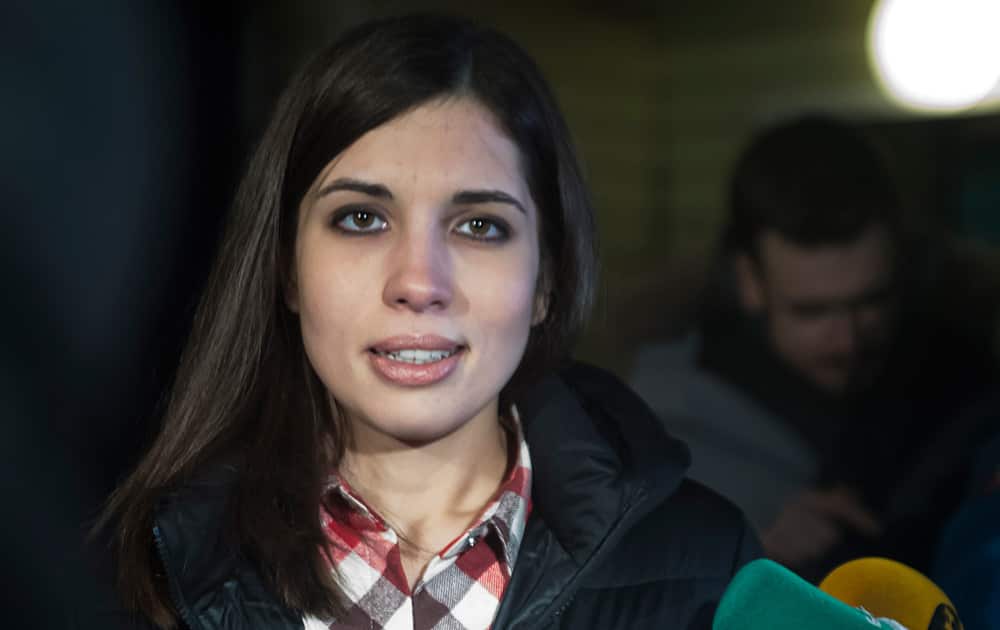 Nadezhda Tolokonnikova speaks to the media as she leaves the prison in Krasnoyarsk, Russia. The third member of the Russian punk band Pussy Riot has been released from custody following an amnesty law passed by parliament.