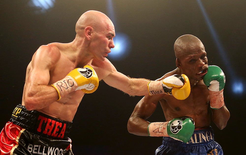 Britain`s Stuart Hall, left, lands a punch to South Africa`s Vusi Malinga during their IBF bantamweight title fight at the First Direct Arena, in Leeds, England.