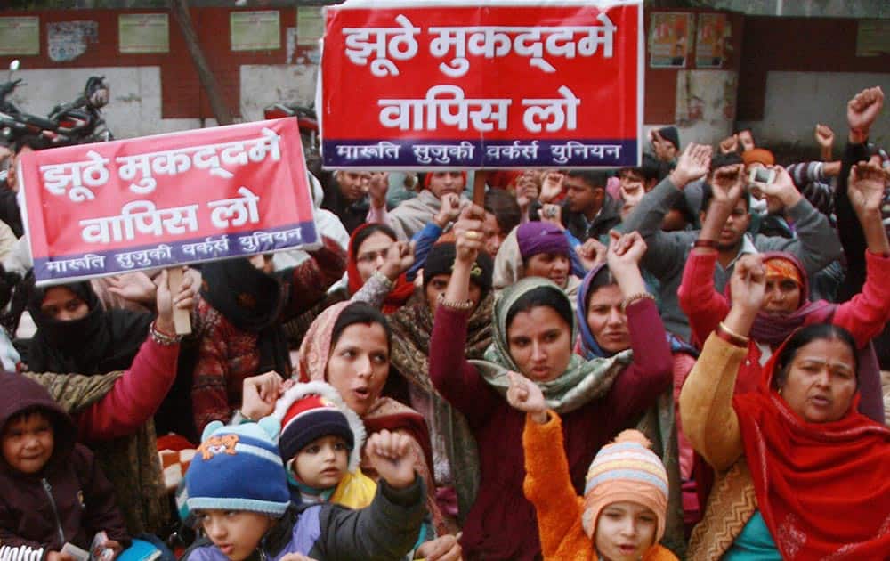Family members of sacked workers of Maruti Suzuki holding a protest march for their demands outside mini-secretariat in Gurgaon.