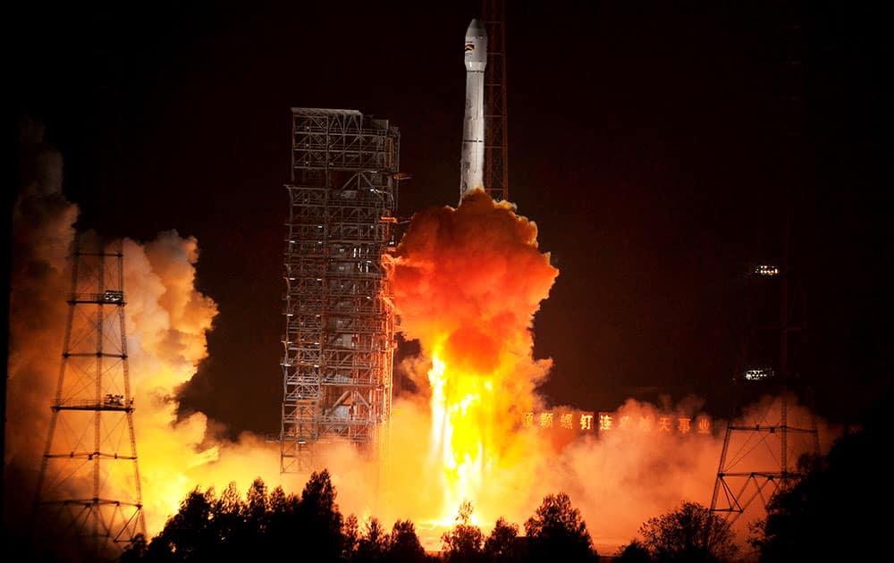 This photo released by China`s Xinhua News Agency, a Bolivian communications satellite is launched from the Xichang Satellite Launch Center(XSLC) in Xichang, southwest China`s Sichuan Province.