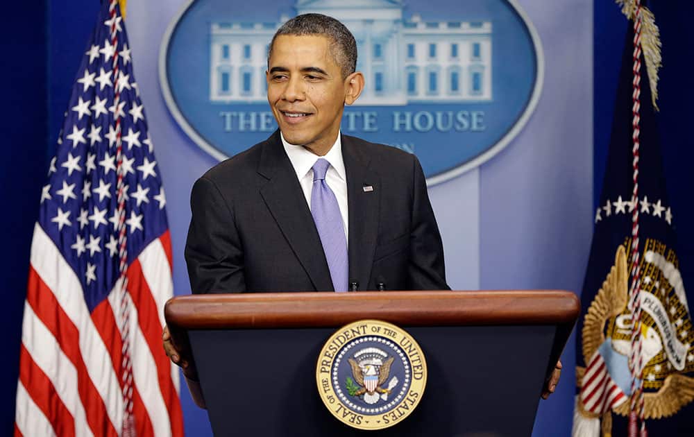 President Barack Obama speaks during an end-of-the year news conference in the Brady Press Briefing Room at the White House in Washington.