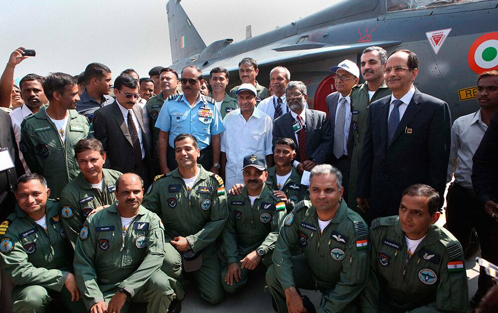 Union Defence Minister A K Antony and Air Chief Marshal N A K Browne with IAF Pilots during initial operational clearance of LCA Tejas for induction into the IAF, in Bengaluru.