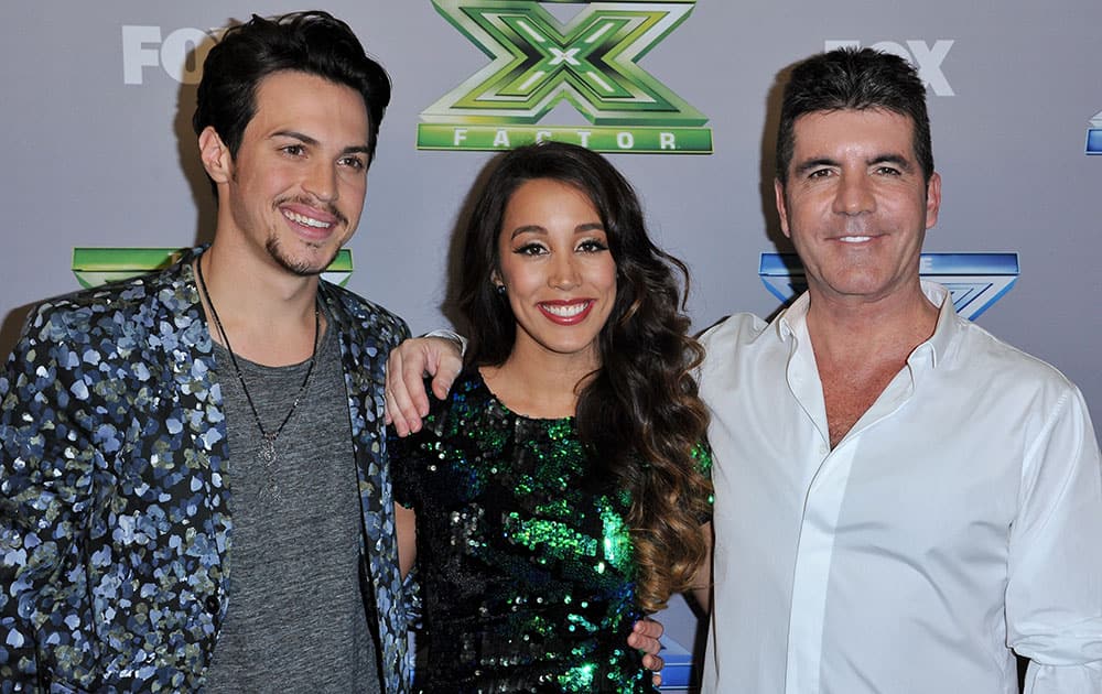 Alex Kinsey, Sierra Deaton, and Simon Cowell attend the `The X Factor` Season Finale at CBS Television City, in Los Angeles.