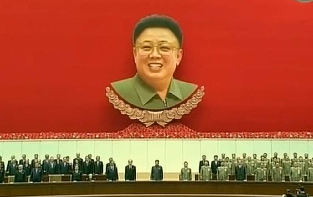 North Korean leader Kim Jong Un, center, attends an event to mark the second anniversary of the death of his father, former leader Kim Jong Il, in Pyongyang, North Korea.