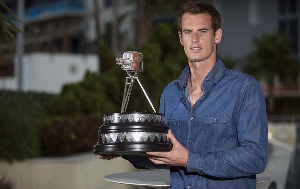 British tennis player Andy Murray poses with his award, in Miami, Florida. Wimbledon Champion Andy Murray was named as the BBC Sports Personality of the Year 2013.