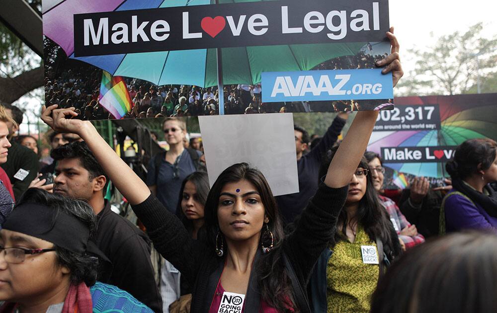 Gay rights activists hold placards during a protest against a Supreme Court verdict that upheld section 377 of the Indian Penal Code that criminalizes homosexuality in New Delhi.