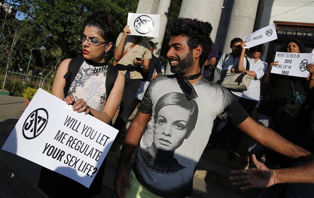 Gay rights activists hold placards as they participate in a protest against a Supreme Court verdict that upheld section 377 of the Indian Penal Code that criminalizes gay sex, in Bangalore.