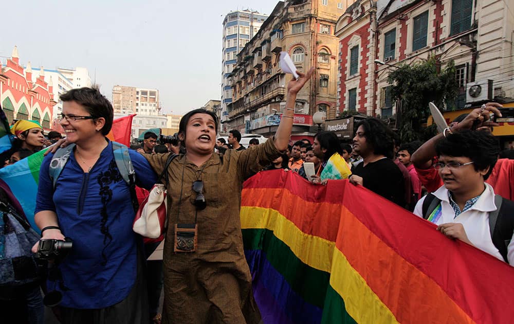 Gay rights activists shout slogans as they protest Supreme Court`s ruling criminalizing gay sex in Kolkata.