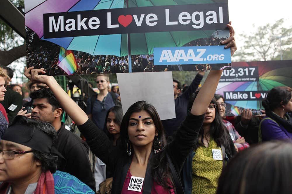 Indian gay rights activists hold placards during a protest against a Supreme Court verdict that upheld section 377 of the Indian Penal Code that criminalizes homosexuality in New Delhi.