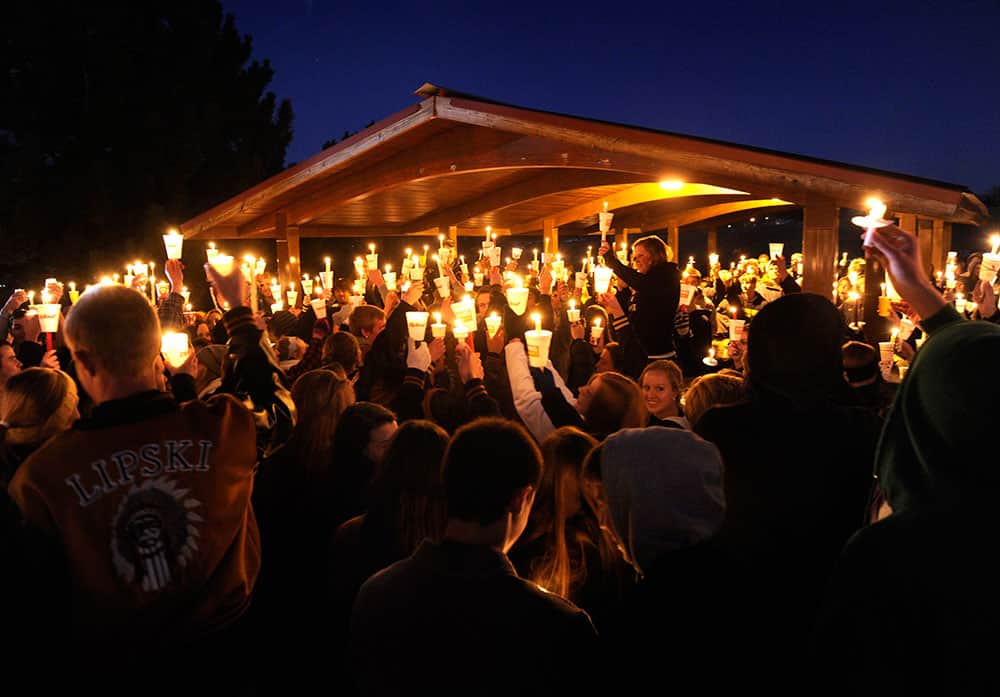Hundreds of Arapahoe High School students gathered for a candlelight vigil Saturday night, to share their prayers for Claire Davis who was shot inside the school.