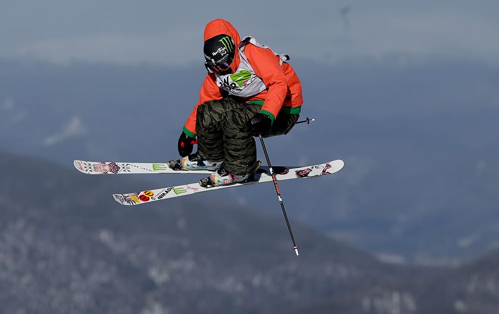 Devin Logan flies off a jump on her first run during the slopestyle freestyle skiing final at the Dew Tour iON Mountain Championships, in Breckenridge, Colo.