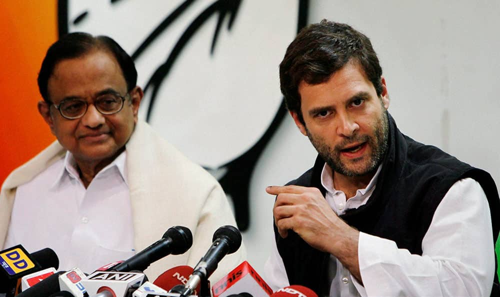 Congress Vice President Rahul Gandhi with party leader P Chidambaram addressing a press conference at AICC office in New Delhi.