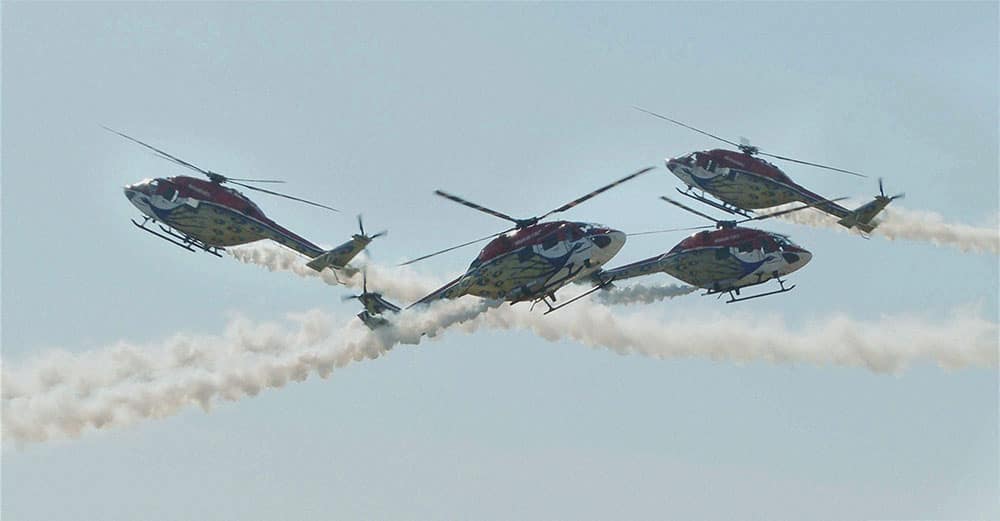 Sarang helicopters perform an air show at the Combined Gradation Parade (CGP) at the Air Force Academy, Dundigal near Hyderabad.