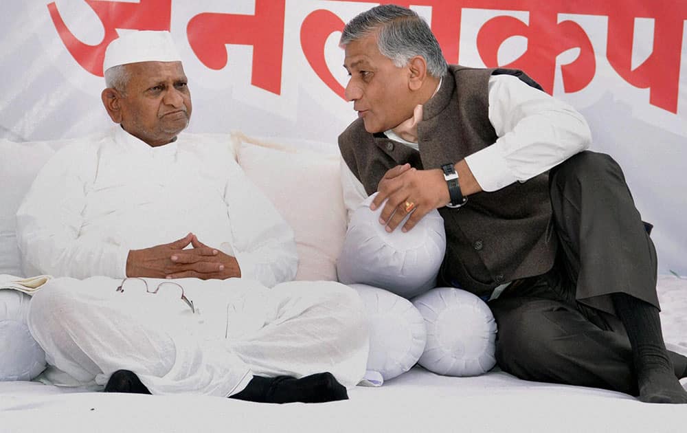Former Army Chief General V K Singh with social activist Anna Hazare during fourth day of the latter`s indefinite hunger strike, at his Ralegan Siddhi village in Ahmednagar.