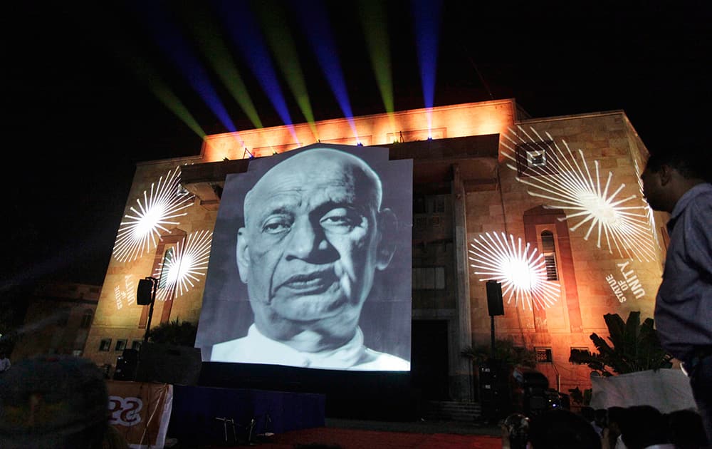 A huge portrait of freedom fighter Sardar Patel is projected on a screen during an event in Ahmadabad. The Gujarat government aims at building the world’s biggest statue of Sardar Patel, also known as the Iron Man of India, of 182 meters (597 feet) as a tribute to him.