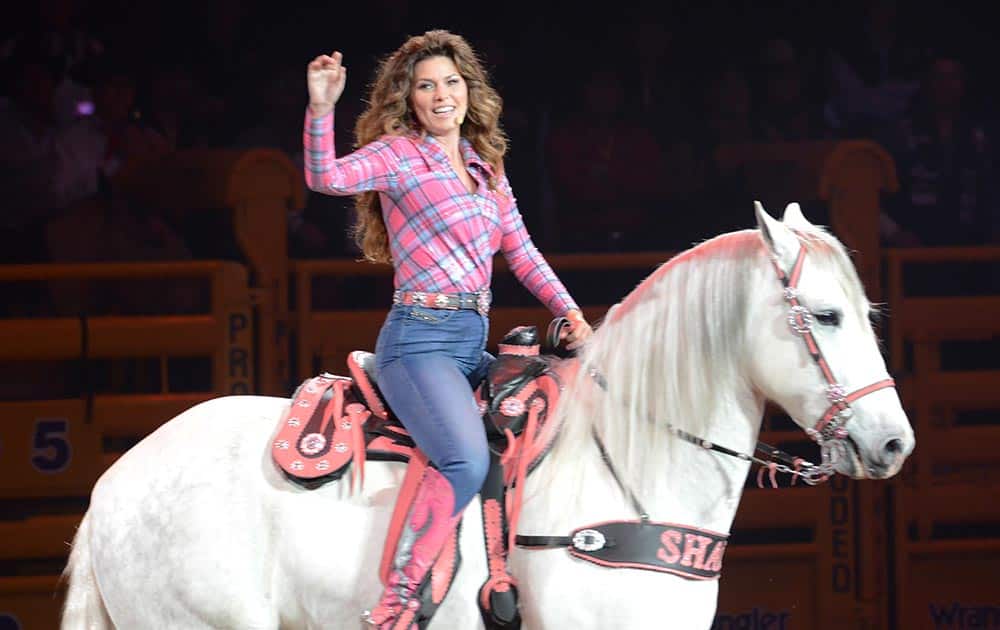 This photo provided by the Las Vegas News Bureau, Canadian singer/songwriter Shania Twain opens Canadian Night, Day 8 of the Wrangler National Finals Rodeo at the Thomas & Mack Arena in Las Vegas.