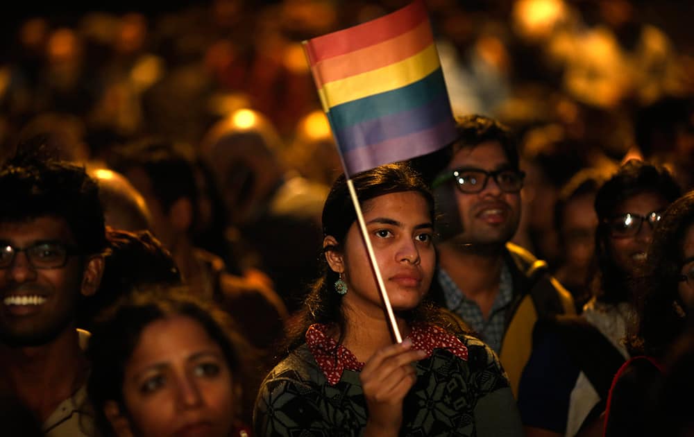 Gay rights activists attend a protest meeting after the top Indian court ruled that a colonial-era law criminalizing homosexuality will remain in effect in India in New Delhi.