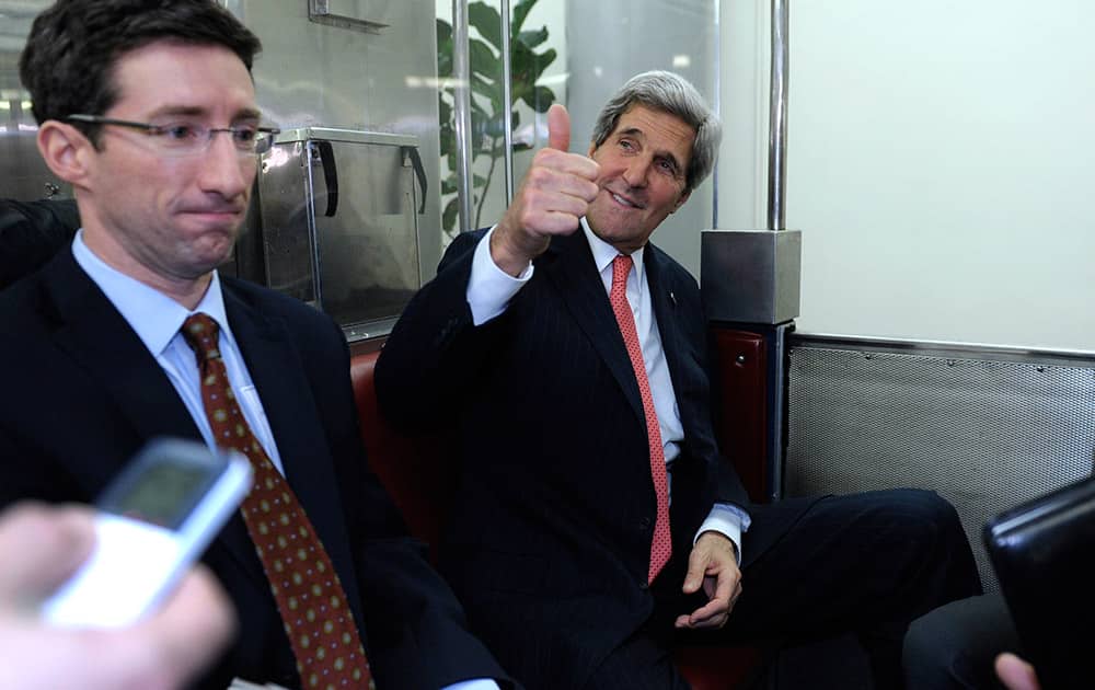 Secretary of State John Kerry responds to a reporters question about his closed-door briefing with Senators on the recent agreement reached between Iran and western powers on Iran`s nuclear program on Capitol Hill in Washington.
