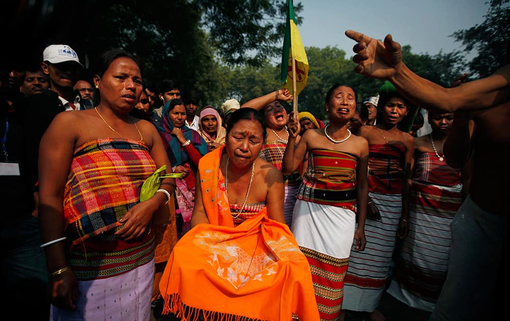 Indigenous people from north eastern Tripura state cry as they demand the creation of a new state called