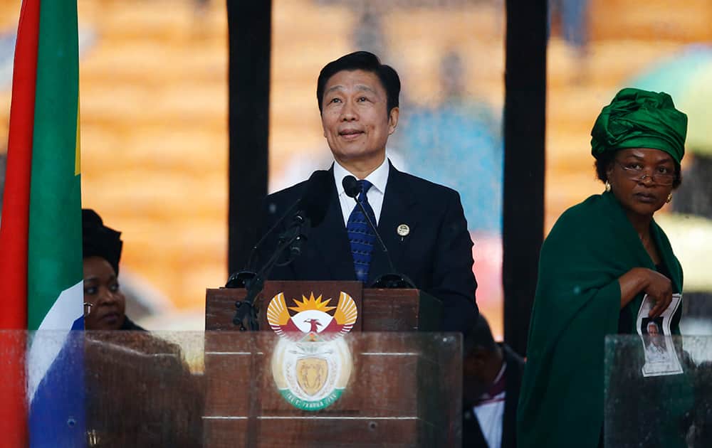 China`s Vice President Li Yuanchao speaks during the memorial service for former South African president Nelson Mandela at the FNB Stadium in Soweto near Johannesburg,.