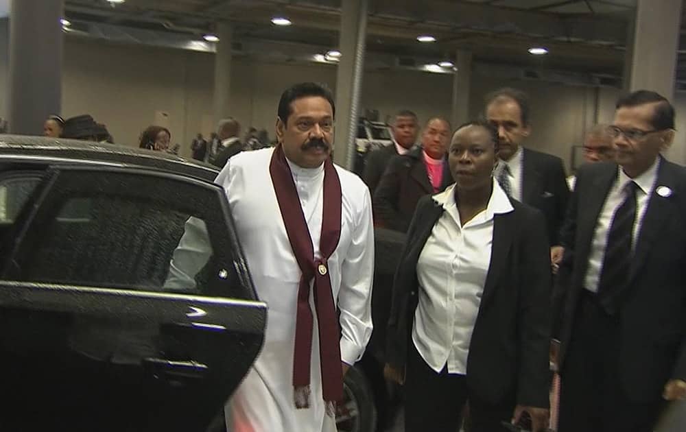 Sri Lankan President Mahinda Rajapaksa arrives at the FNB Stadium in Soweto, South Africa, ahead of a memorial service for former South African President Nelson Mandela.