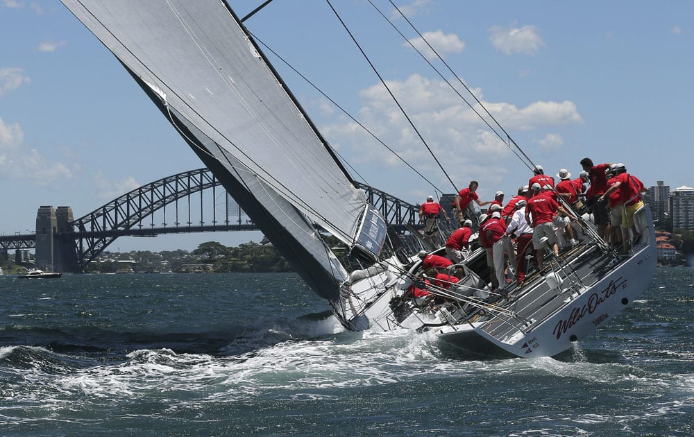 Wild Oats XI races towards the Harbour Bridge during the Big Boat Challenge in Sydney, Australia.