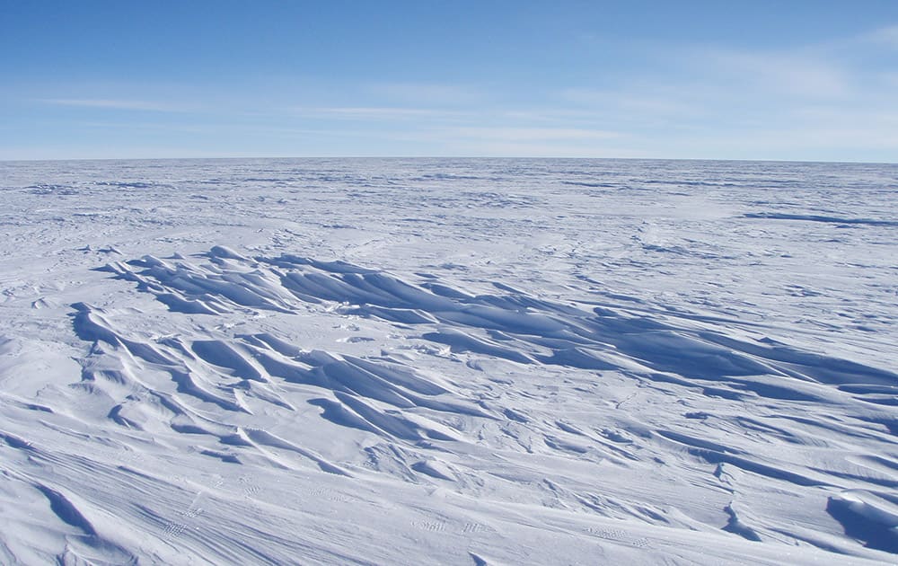 In this image provided by the National Snow and Ice Data Center, sastrugi stick out from the snow surface in this photo near Plateau Station in East Antarctica in 2008.