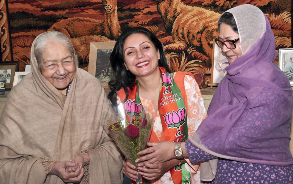 BJP candidate Princess Siddhi Kumari with her mother Padma Devi and grandmother Rajmata Sushila Devi after her victory in Assembly elections, in Bikaner.