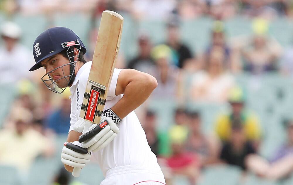 England`s Alastair Cook leaves a ball from Australia`s Mitchell Johnson during the fourth day of the second Ashes cricket test match between England and Australia.