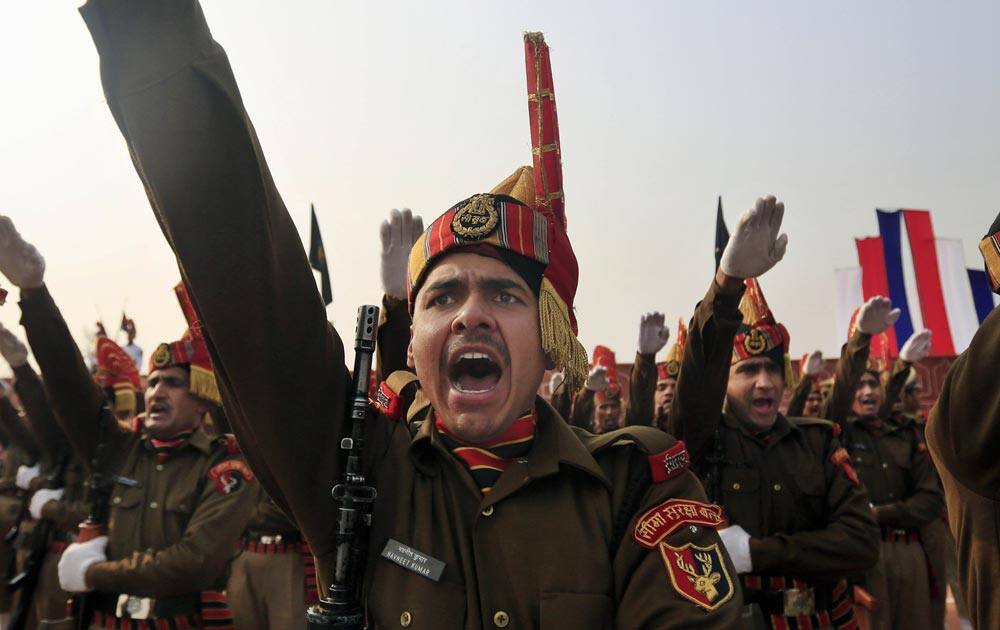 New recruits of the Indian Border Security Force (BSF) take oath during the passing out parade ceremony in Humhama, on the outskirts of Srinagar.