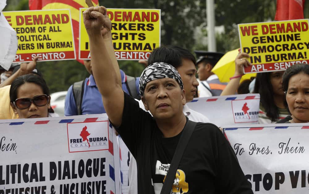 Protesters picket the Department of Foreign Affairs to coincide with the state visit of Myanmar President Thein Sein in Manila, Philippines.