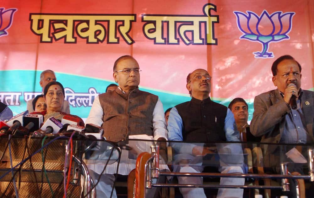 Senior BJP leaders Sushma Swaraj, V K Malhotra, Arun Jaitley and Delhi BJP president Vijay Goel look on as BJP CM candidate Harsh Vardhan addressing a press conference in New Delhi.