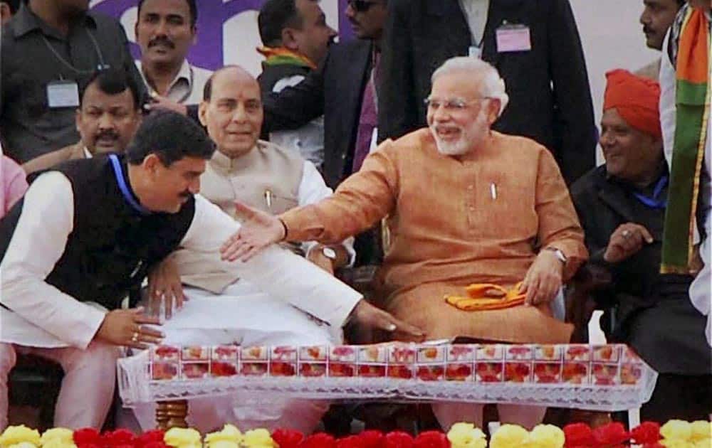 BJP prime ministerial candidate Narendra Modi with BJP national president Rajnath Singh during Lalkar Rally at MA Stadium in Jammu.