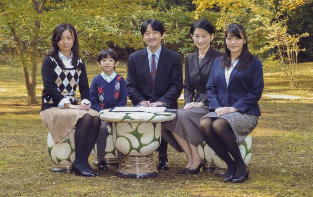 This photo taken Nov. 16, 2013 and released by Imperial Household Agency of Japan, Japan`s Prince Akishino and his wife Princess Kiko, are seated with their children, Princess Kako, Prince Hisahito, and Princess Mako at the Akasaka imperial estate in Tokyo.