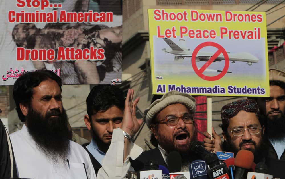 Hafiz Saeed, center, head of Pakistani religious group Jamaat-ud-Dawa addresses an anti-American rally in Lahore.