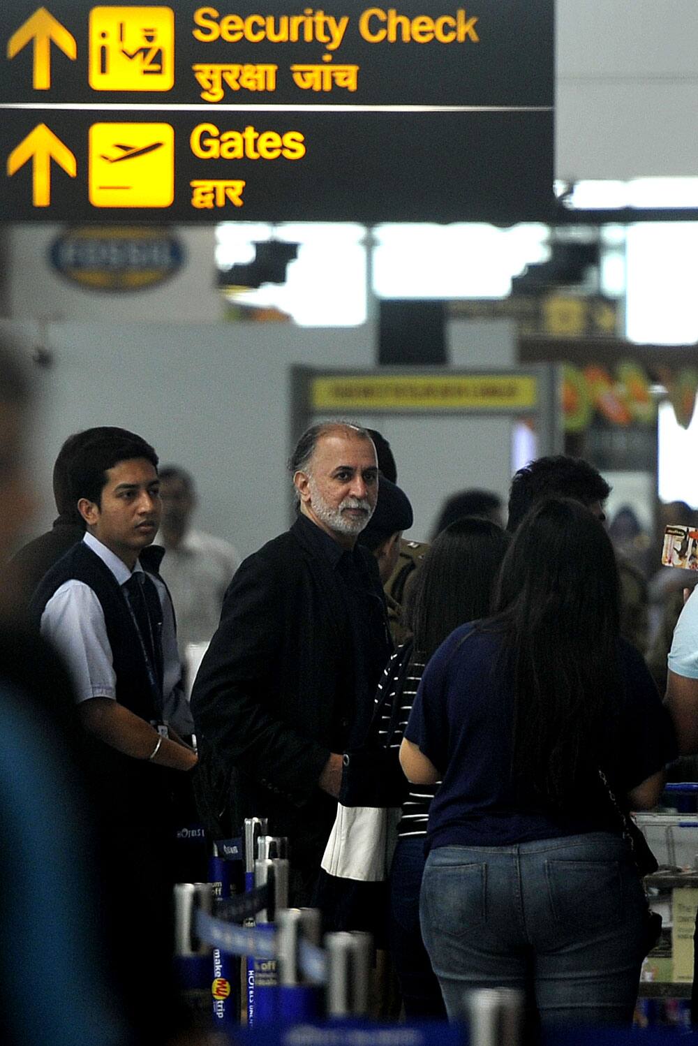 Tehelka editor-in-chief Tarun Tejpal at the Indira Gandhi International Airport in New Delhi on Friday before boarding flight to Goa. Pic Courtesy: arijit sen. Dna